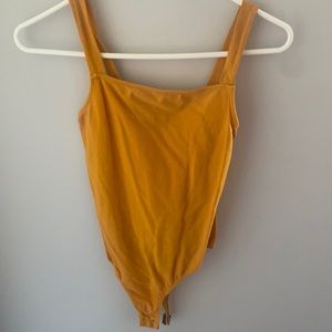 Mustard body suit